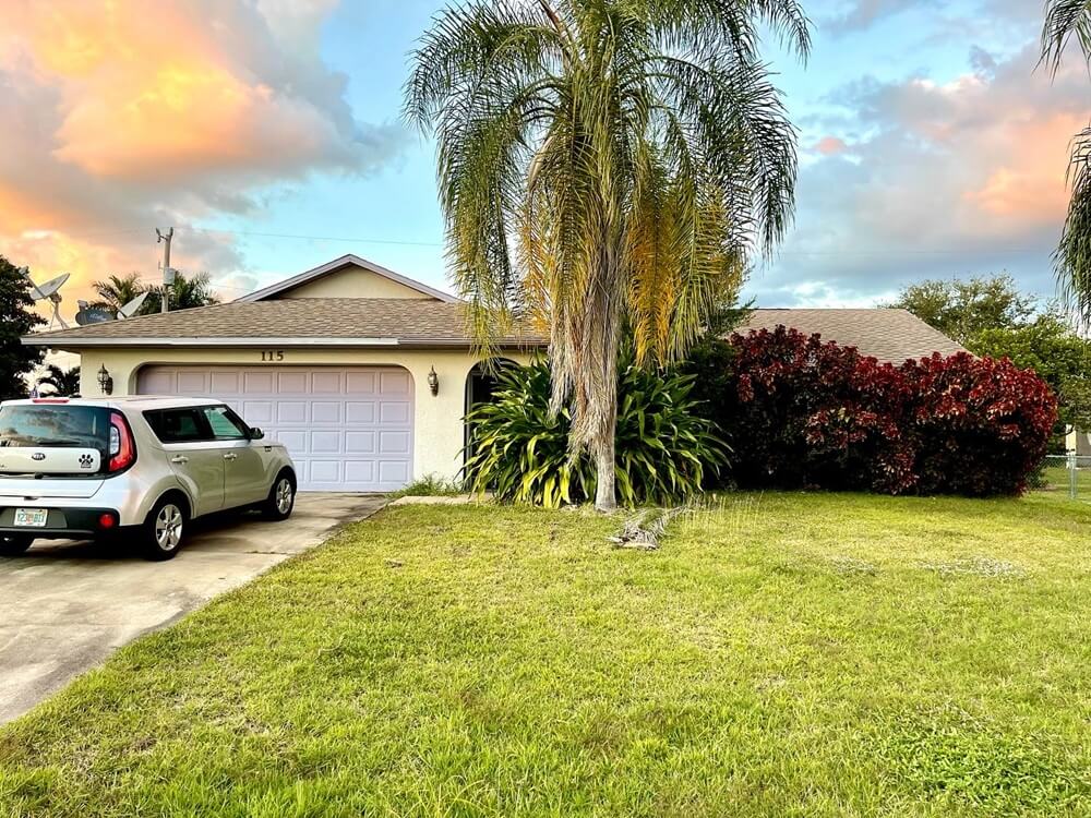 Distressed home in Port Charlotte before renovation